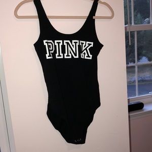 Black Bodysuit with Pink Written on it